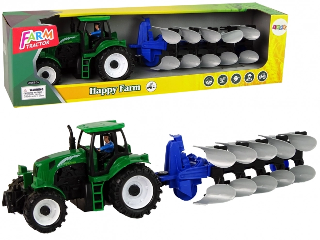 Zielony traktor rolniczy z pługiem