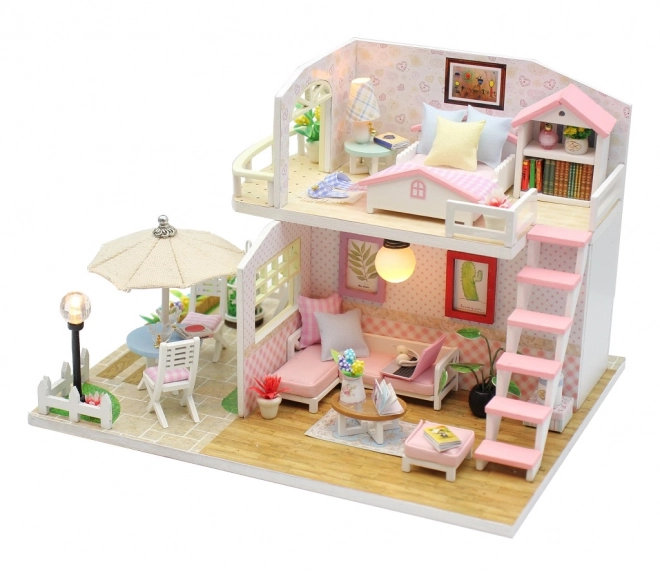 Dwujęzyczny miniaturowy domek Różowy dom