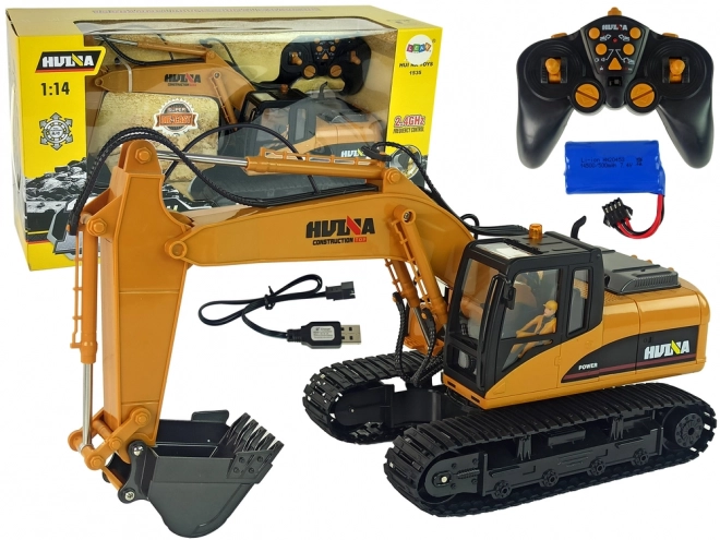 Żółty RC koparka Caterpillar 1:14 na zdalne sterowanie
