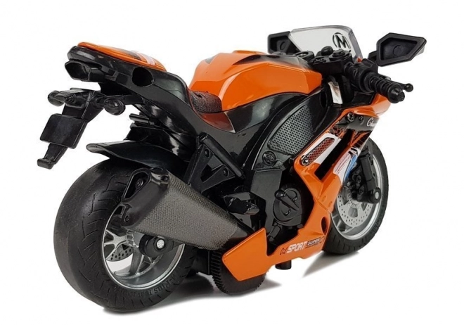 Pomarańczowa zabawka motocykl z napędem