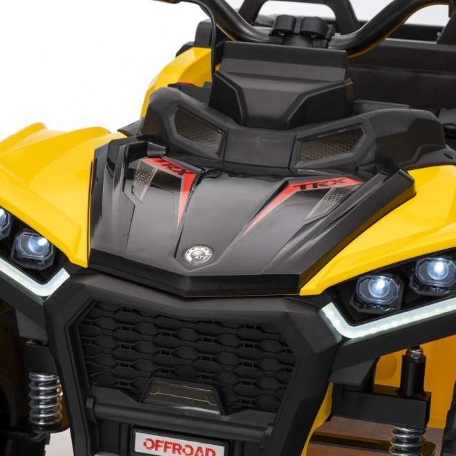Żółty sportowy dziecięcy quad TX ATV