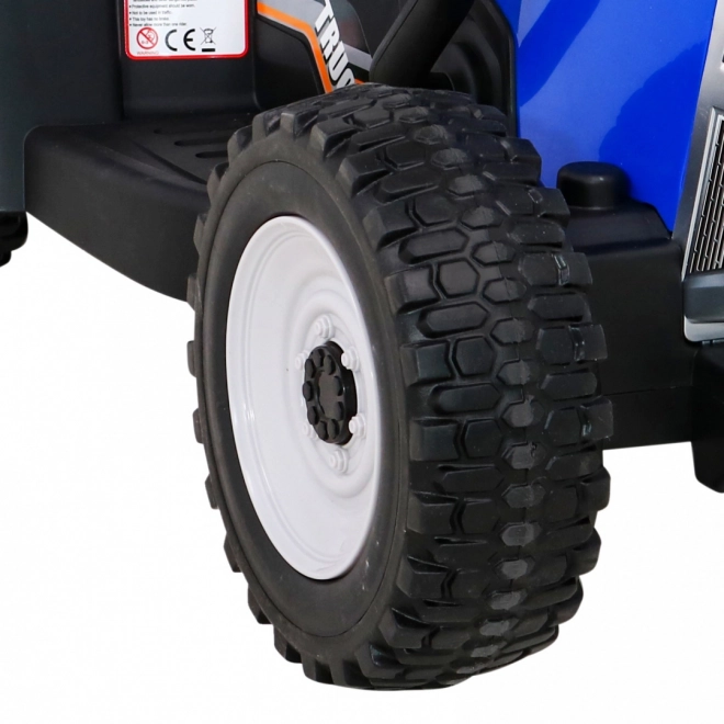 Dziecięcy traktor z przyczepą niebieski