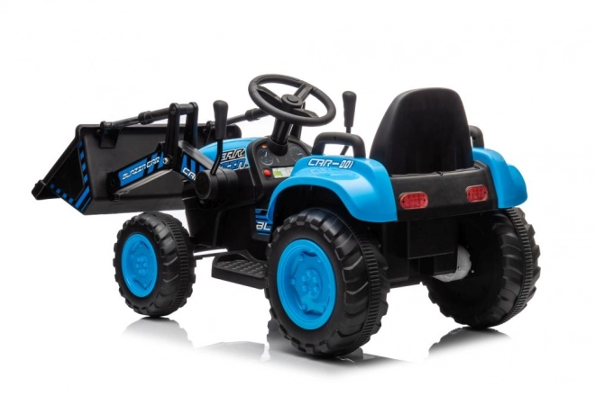 Elektryczny dziecięcy traktor z łyżką niebieski