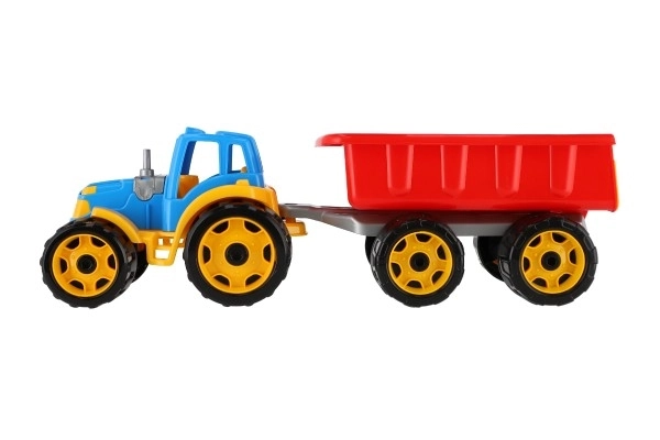 Traktor z przyczepą plastikowy 53cm na wolny bieg w siateczce