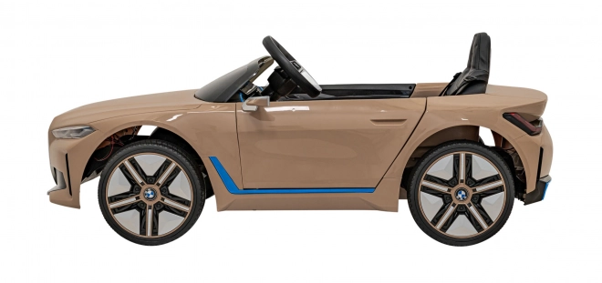 Samochód dziecięcy na baterię BMW i4 – Złoty