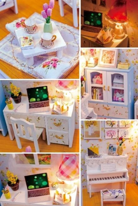 Dziewięć miniaturowych domków w pokoju Hemioliin