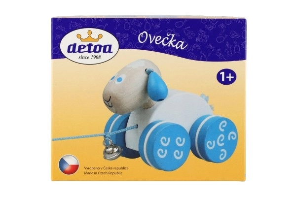 Drewniana owieczka na sznurku