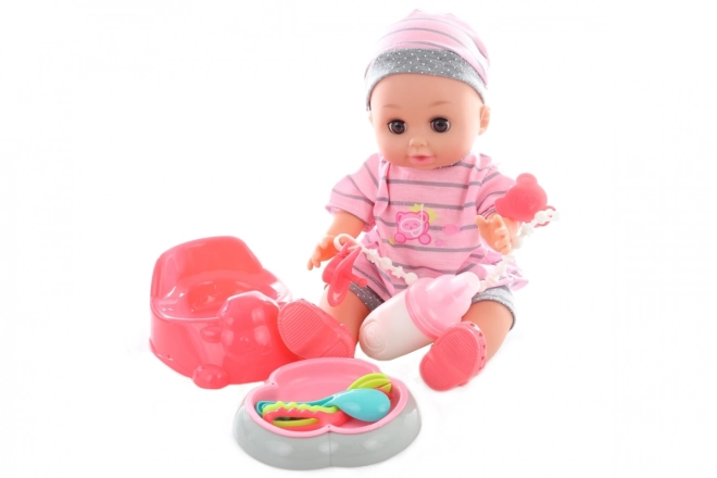 Laleczka sikająca 28 cm z dźwiękiem i akcesoriami