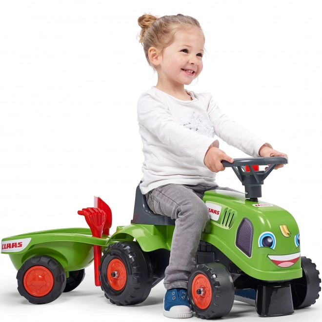Jeździk traktor Claas zielony z kierownicą i przyczepą