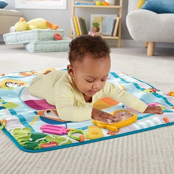 Fisher Price mata edukacyjna z motywem basenu