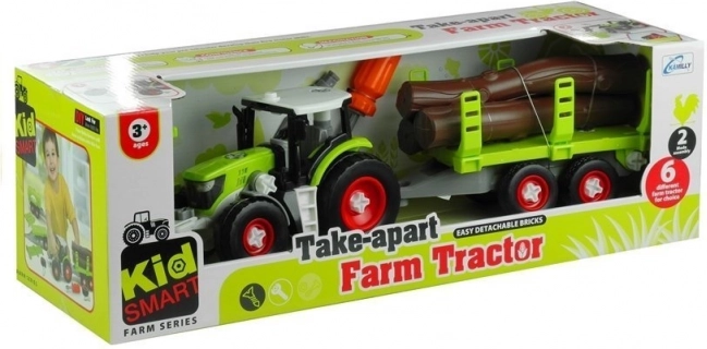 Rozkładany traktor z przyczepą na drewno