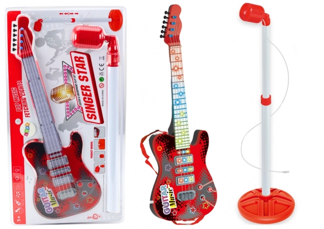 Elektryczna gitara ze stojakiem i mikrofonem na baterie, czerwona
