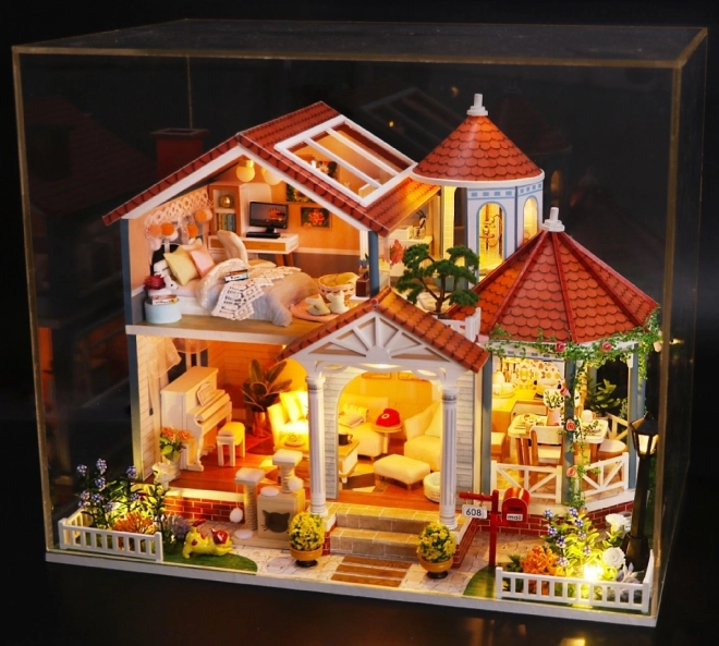 Dziewięć miniatur domków Dom kolorowej glazury