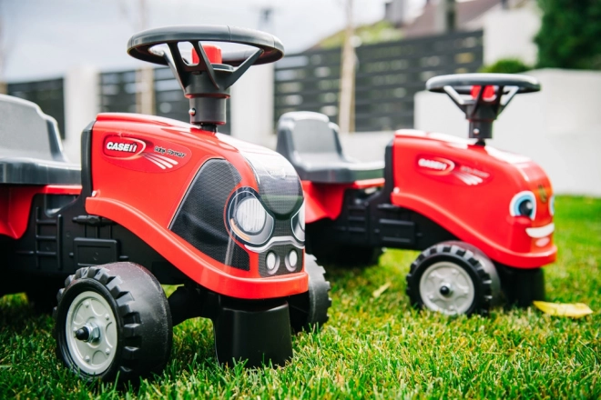 Jeżdżący traktor Baby Case IH czerwony z przyczepą
