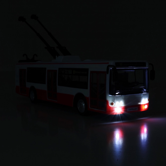 Trolejbus mówiący po czesku plastikowy 29cm czerwony wolny ruch na bat. ze światłami z dźwiękiem w opak. 33x11x10cm