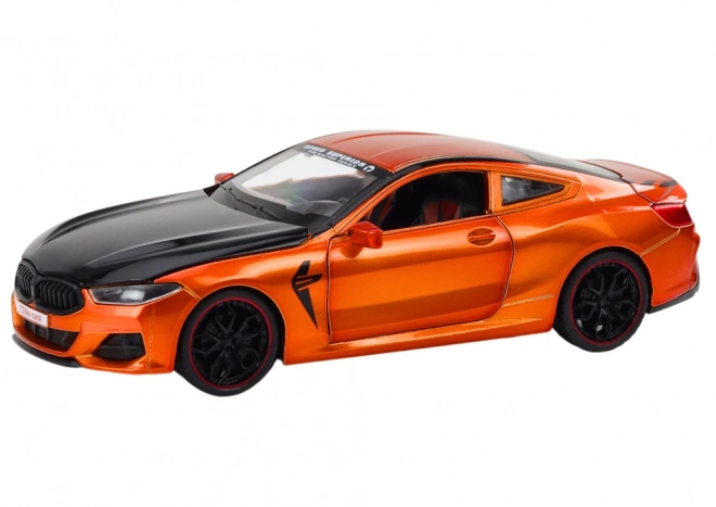Metalowy model sportowy z napędem ciernym i otwieranymi elementami 1:24 pomarańczowy
