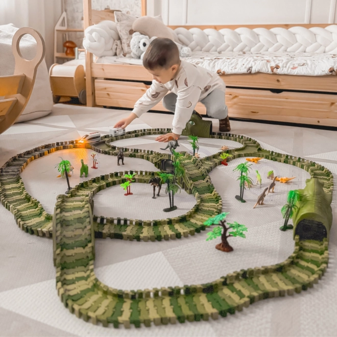 Dinozaurzy tor wyścigowy z samochodzikiem i figurkami
