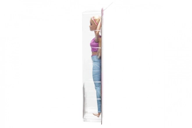 Barbie w ruchu - Blondynka w niebieskich legginsach HRH27