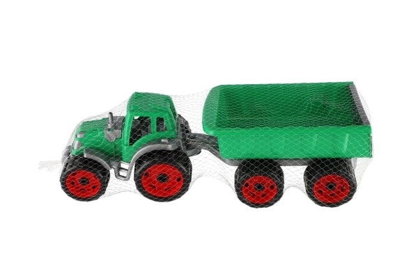 Traktor z przyczepą plastikowy 53cm na wolny bieg w siateczce