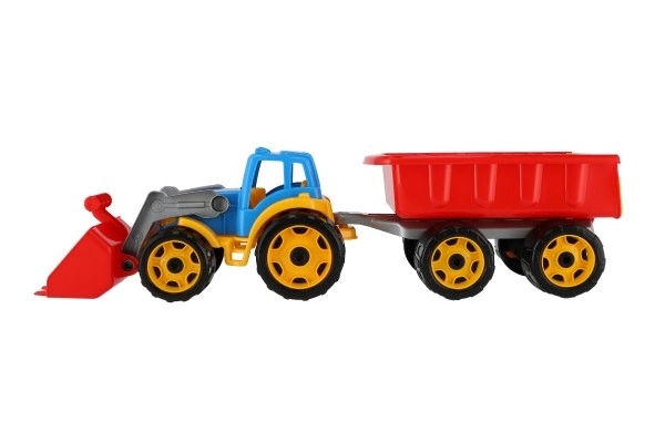 Traktor/ładowarka/koparka z przyczepą z plastikową łyżką na wolnym biegu 2 kolory w siatce 16x61x16cm