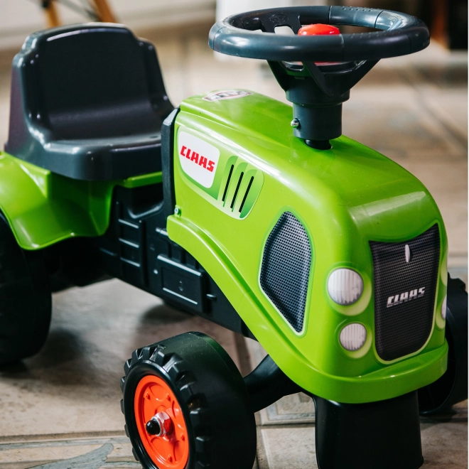 Jeździk traktor Claas zielony z kierownicą i przyczepą