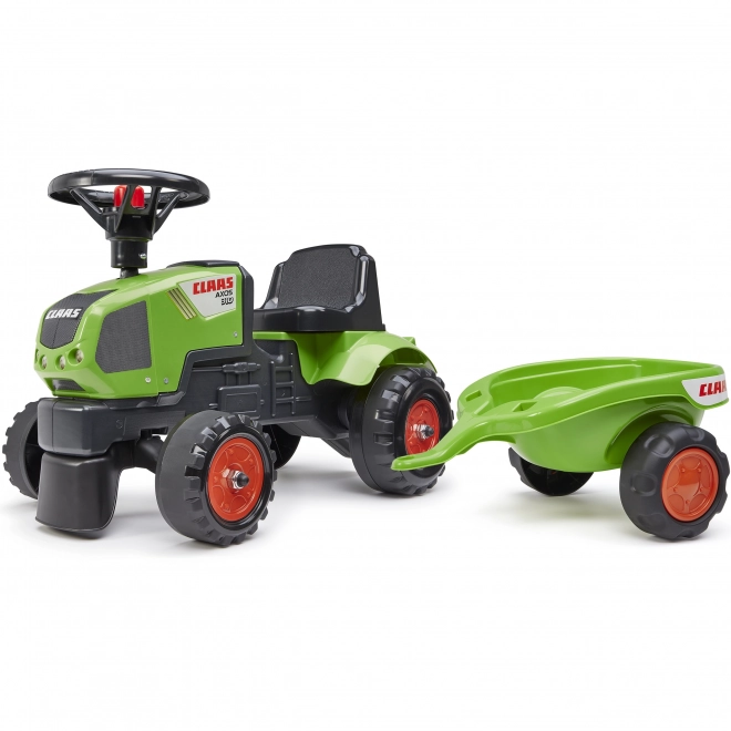 Odpychacz - traktor Claas z kierownicą i przyczepą