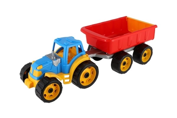 Traktor z przyczepą plastikowy 53cm na wolny bieg w siateczce