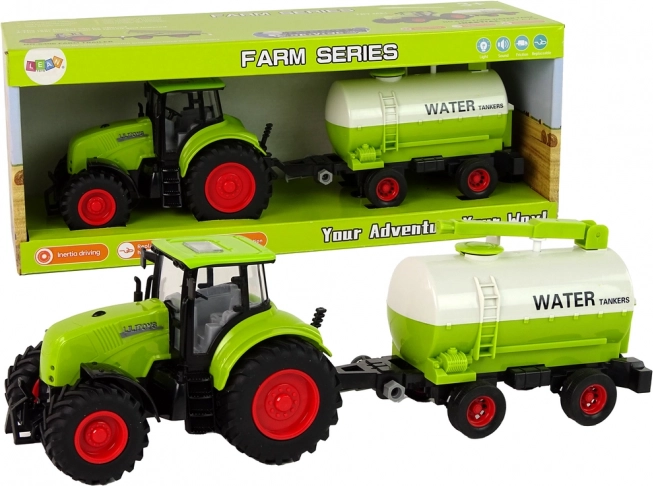 Zielony traktor z przyczepą na dużych kołach