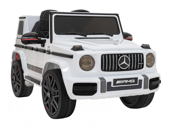 Mercedes AMG G63 dla dzieci biały + zdalne sterowanie + MP3 LED + wolny start + EVA + pasy