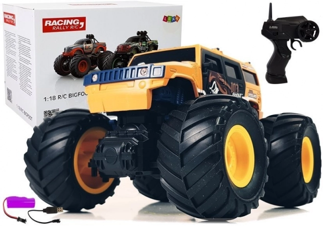 Samochód terenowy z dużymi kołami Bigfoot na zdalne sterowanie 2.4G 1:18 żółty