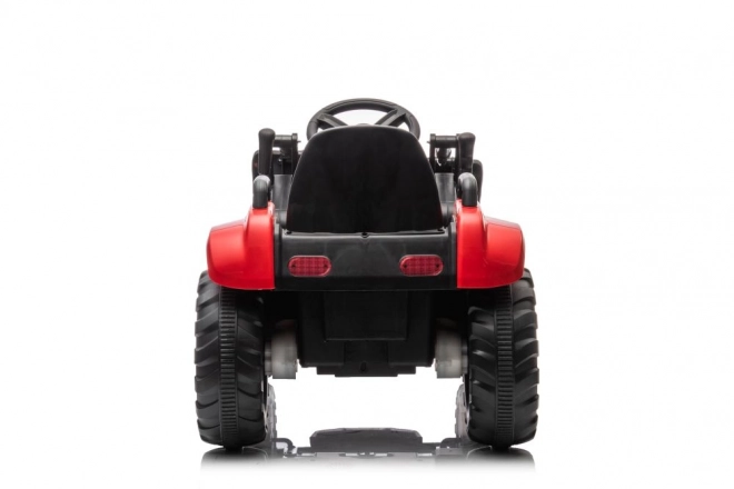 Dziecięcy czerwony traktor z ładowanym akumulatorem i łyżką