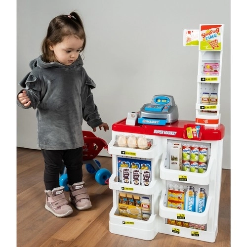 Supermarket z kasą, koszykiem na zakupy i dodatkami