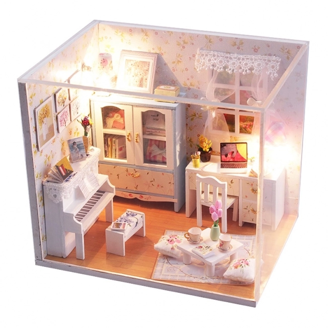 Dziewięć miniaturowych domków w pokoju Hemioliin