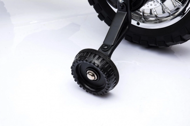 Dziecięcy elektryczny motocykl cross na akumulator – zielony, z kółkami pomocniczymi i światłami LED
