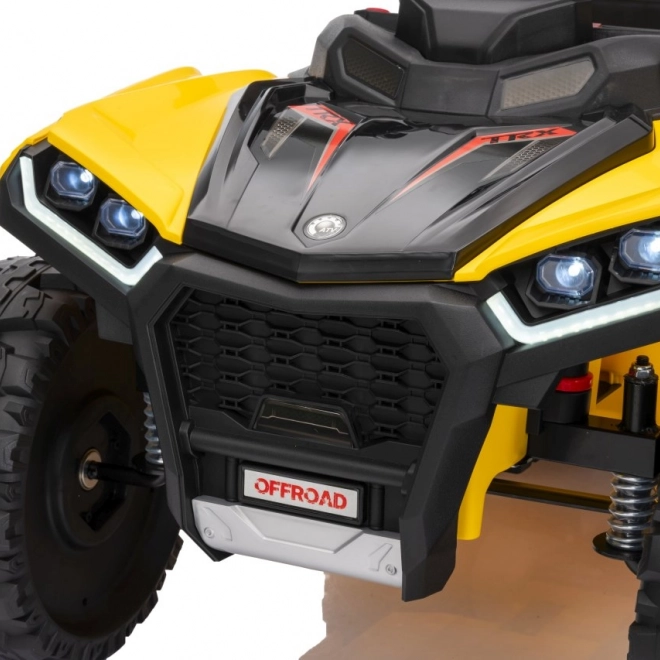 Żółty sportowy dziecięcy quad TX ATV