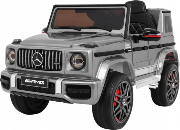 Dziecięcy elektryczny samochodzik Mercedes‑AMG G63 ze srebrnym lakierem, pilotem i MP3