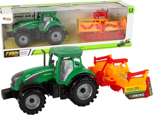 Zielony traktor z pomarańczowym kultywatorem – zestaw z napędem ciernym dla dzieci