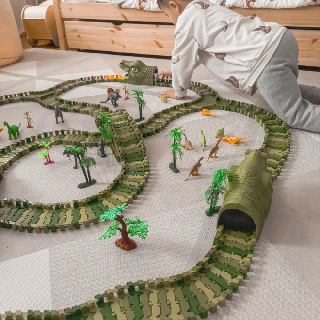 Dinozaurzy tor wyścigowy z samochodzikiem i figurkami