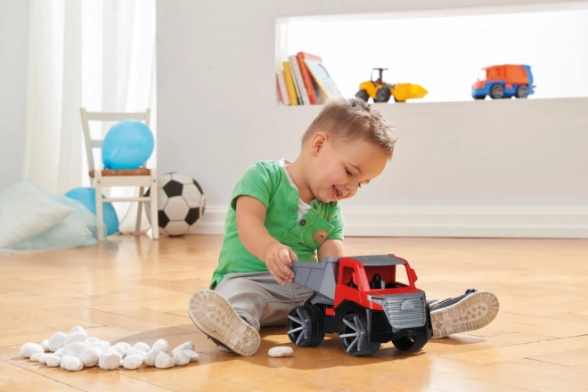 Auto Truxx 2 ciężarówka wywrotka plastikowa 26cm z figurką 27x15x16cm 24m+