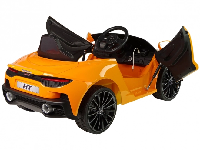 Dziecięcy samochód na baterie McLaren GT pomarańczowy