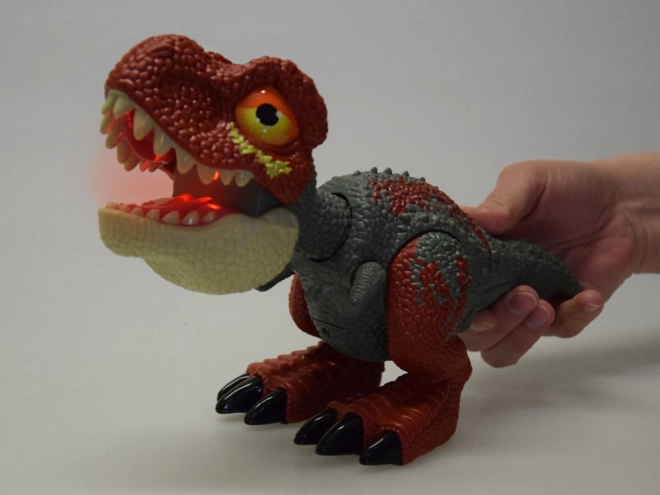 Dinozaur Tyrannosaurus Rex z ruchomymi częściami i efektami dźwięku i światła