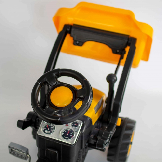 Dziecięcy traktor na pedały z przednią ładowarką