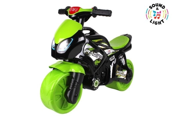 Odpychacz motocykl zielono-czarny plastik na baterie ze światłem i dźwiękiem w worku 36x53x74cm