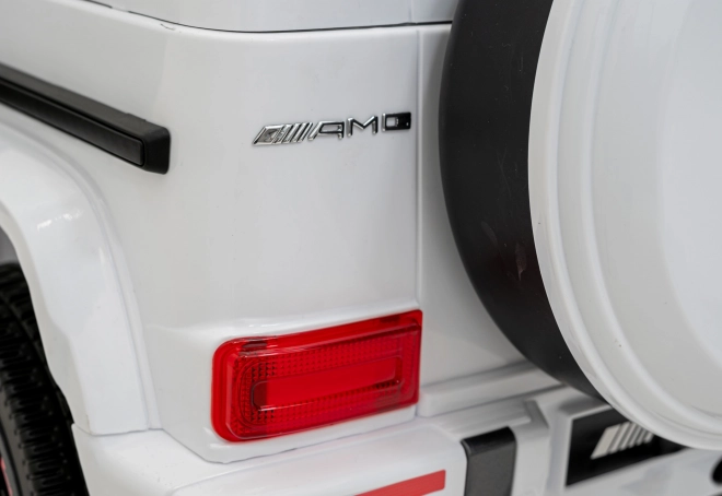 Mercedes AMG G63 dla dzieci biały + zdalne sterowanie + MP3 LED + wolny start + EVA + pasy