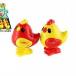 Skaczące kurczątko na kluczyk z plastiku 7 × 9 cm, 2 kolory