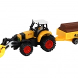 Traktor z przyczepą żółto-czerwony