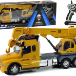 Zdalnie sterowana żółta ciężarówka z dźwigiem i dźwiękami