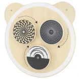 Drewniana tablica ścienna z obracającymi się elementami