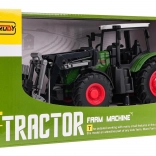 Zielony traktor z chwytakiem